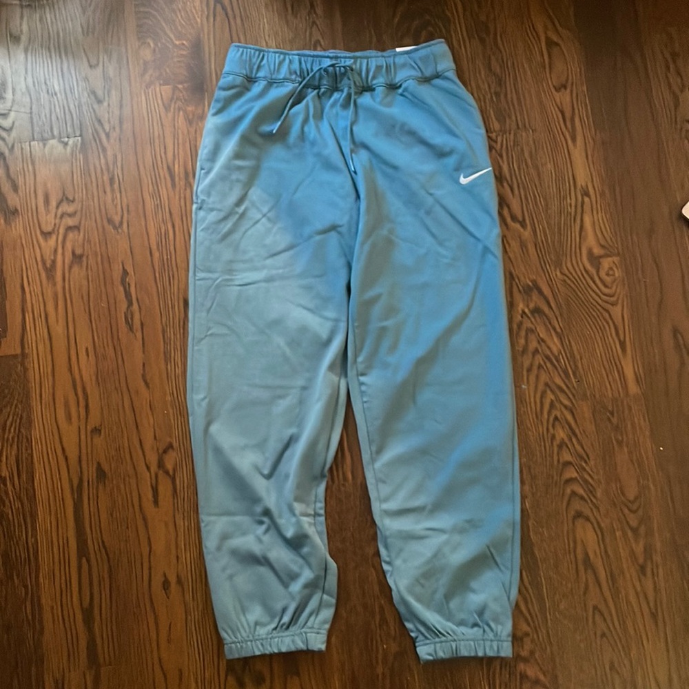 Never worn- blue nike sweatpants